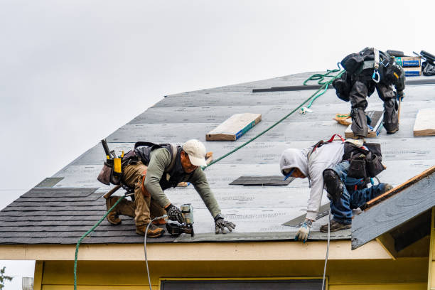 Professional Gutter Installation technician working in Millbury, MA